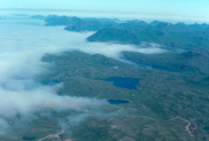 Adak, Mitt Lake (foreground), Lake Leone, east toward Kagalaska & Tanaga Islands - Aug. 1974  Photo by Michael Hein