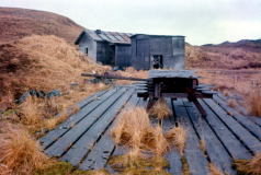 Adak, Road to Finger Bay, WWII building - Jan. 1974  Photo by Michael Hein