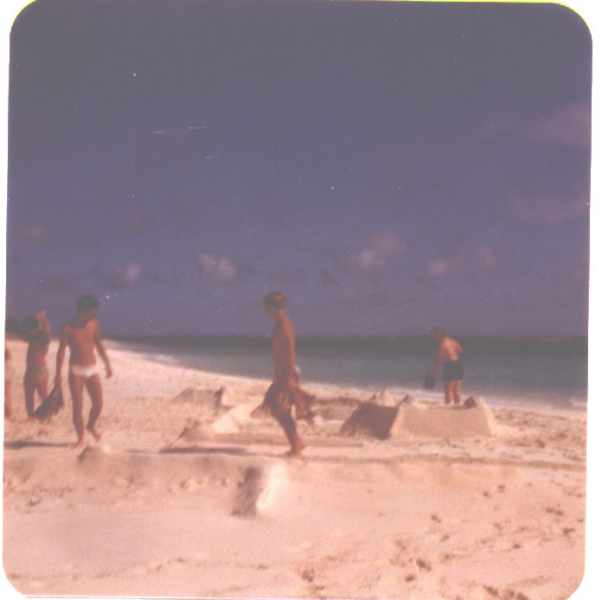Building a sandcastle on NavFac Beach; Oct 76