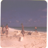Building a sandcastle on NavFac Beach; Oct 76