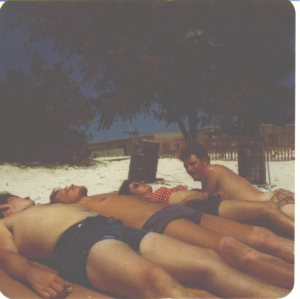 NavFac Midway raft with beach bums;  April 76