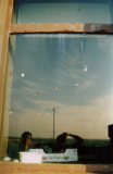 2002: Bullet marks on the Guard Room window