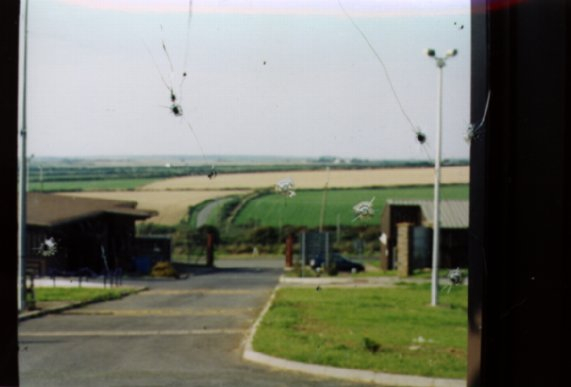 2002: Bullet marks on the Guard Room window from the inside, looking out
