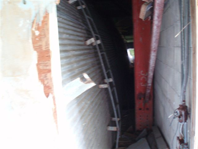 Evidence of old quonset hut T-Bldg under concrete block bldg Dec2006