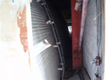 Evidence of old quonset hut T-Bldg under concrete block bldg Dec2006