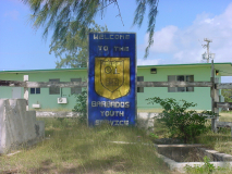 Navfac Barbados sign and back of Admin