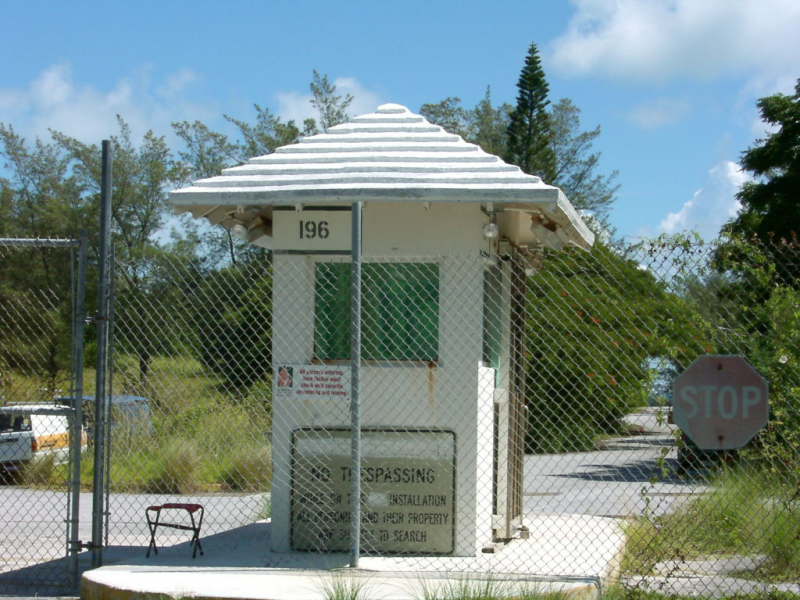 BDA- Front gate to Naval Station Annex. Closed due to condition of buildings.